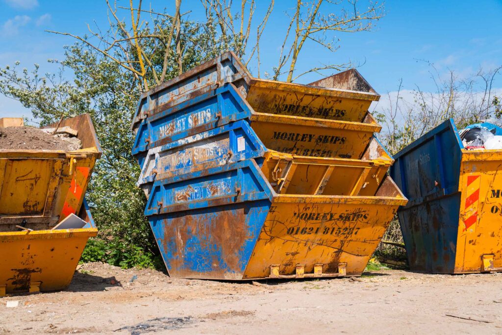 Image of Morley Skips stacked for blog Skip Hire For Commercial Use