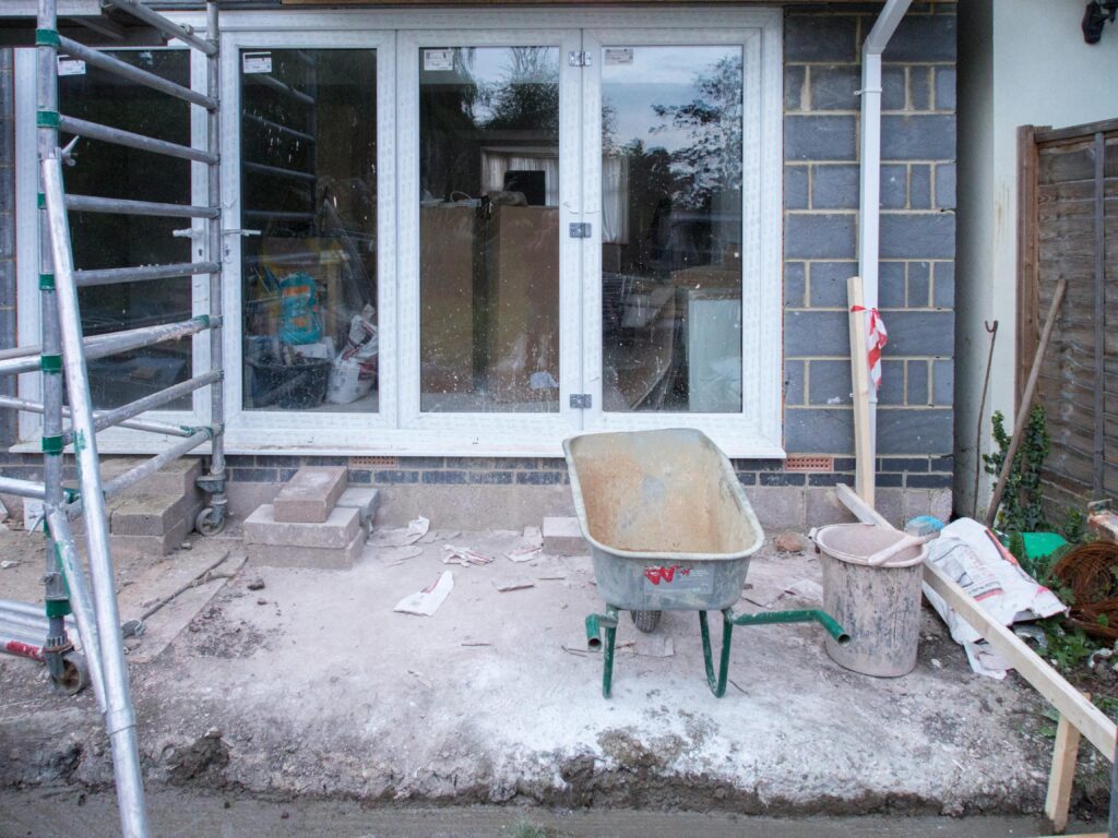 Image of home being extended at the back for the blog Hiring A Skip For Your Home Extension Project